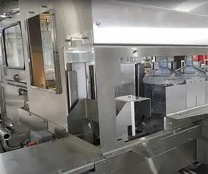900 BPH Structural Washer - Steelhead Inc. - Custom Bottling Solution